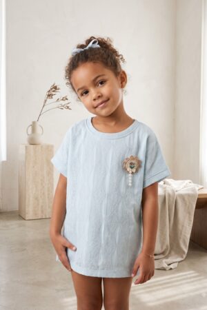 Girls Light Blue Textured Top with Floral Brooch and Pearl Detail